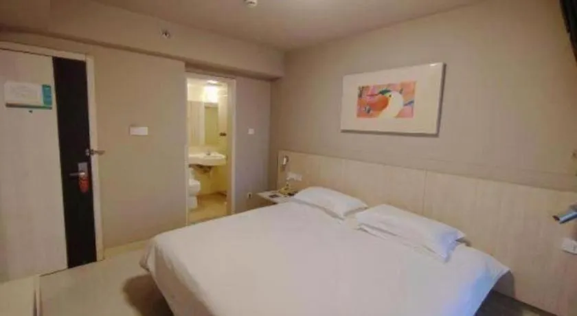 Bed in Jinjiang Inn Wuhu Fangte Tech Museum Metro Station