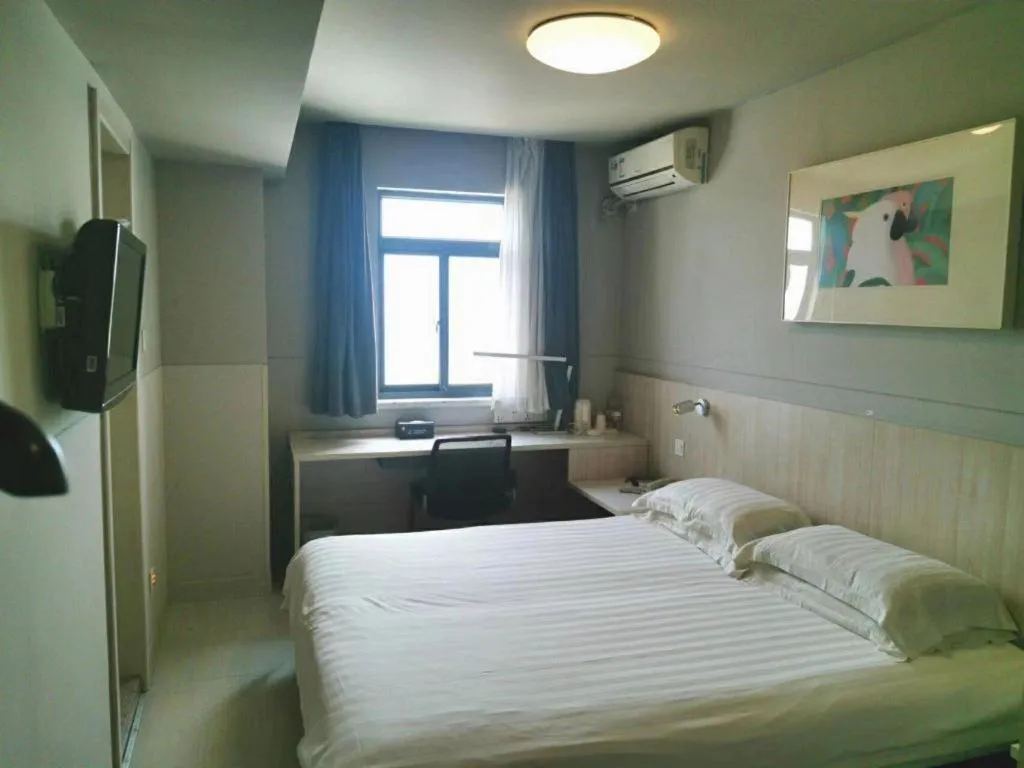 Bed in Jinjiang Inn Wuhu Fangte Tech Museum Metro Station