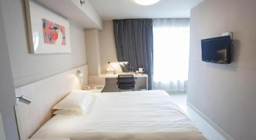 Bed in Jinjiang Inn Wuhu Fangte Tech Museum Metro Station