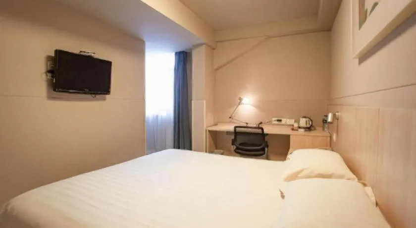 Bed in Jinjiang Inn Wuhu Fangte Tech Museum Metro Station