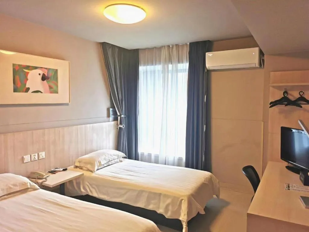 Bed in Jinjiang Inn Wuhu Fangte Tech Museum Metro Station