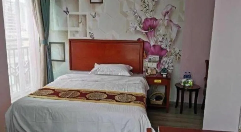 Bed in GreenTree Inn Suzhou Shengze Hotel