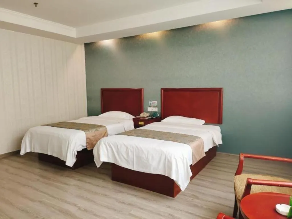 Bed in GreenTree Inn Suzhou Shengze Hotel