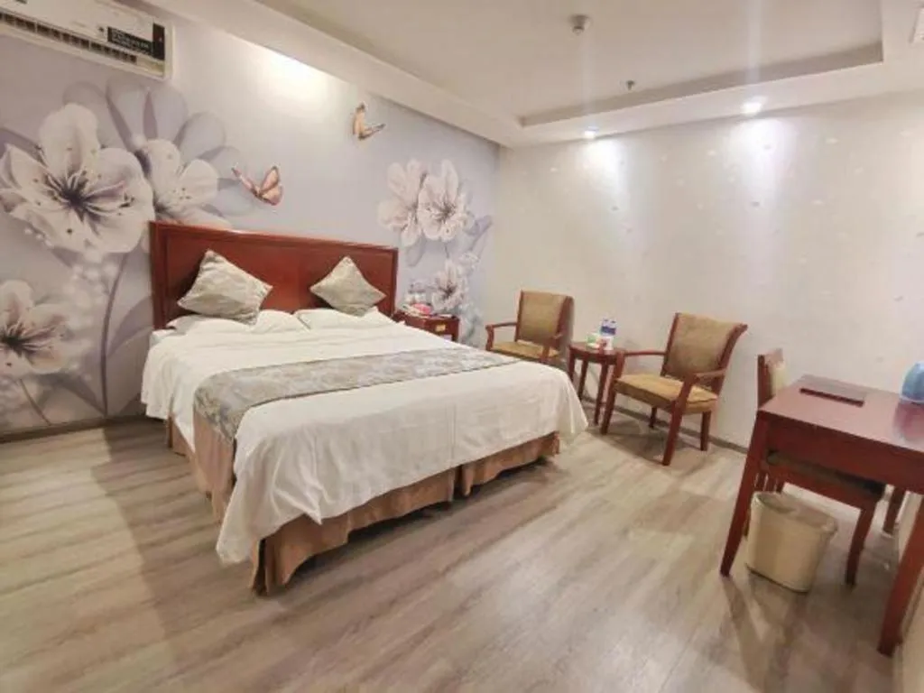 Bed in GreenTree Inn Suzhou Shengze Hotel