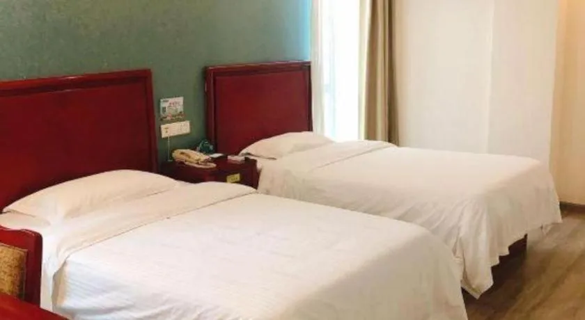 Bed in GreenTree Inn Suzhou Shengze Hotel