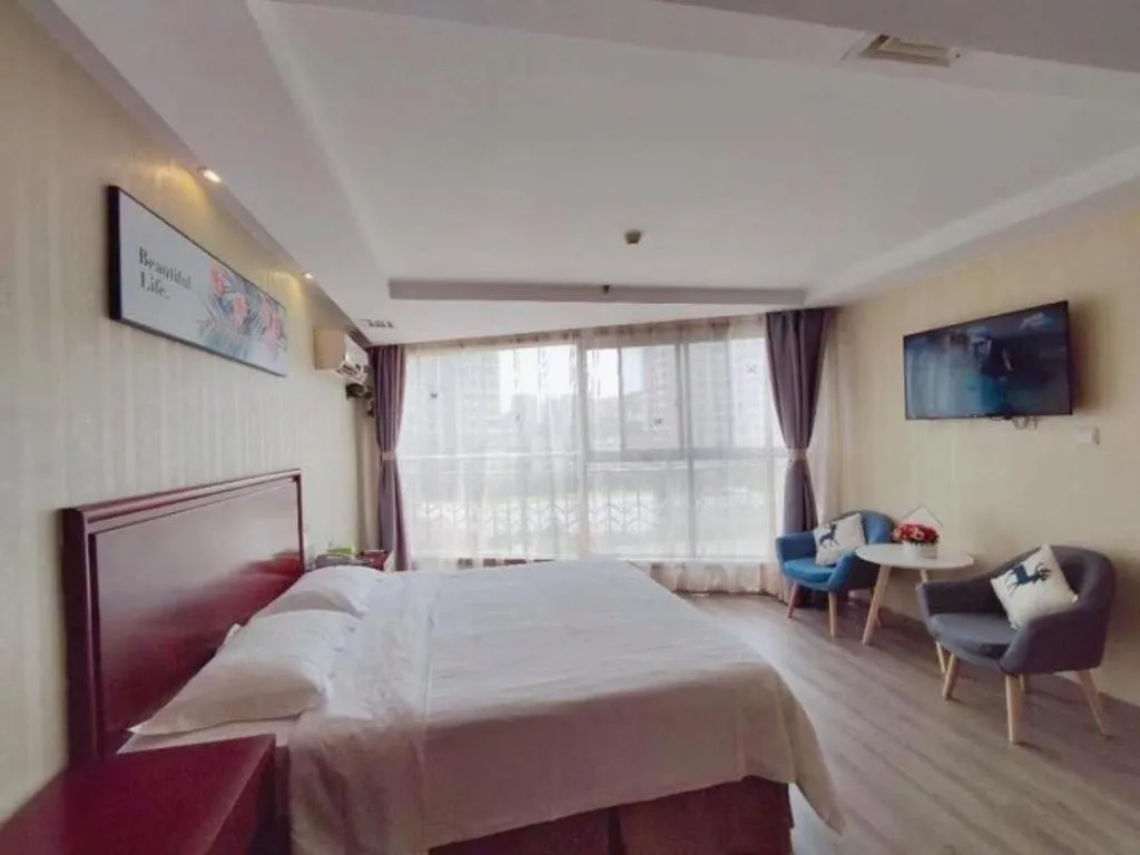 Bed in GreenTree Inn Suzhou Shengze Hotel