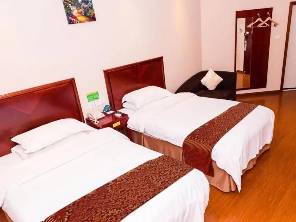 Bed in GreenTree Inn Suzhou Shengze Hotel