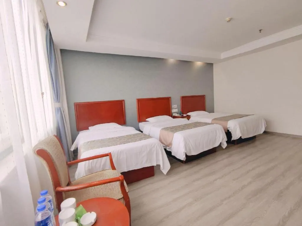 Bed in GreenTree Inn Suzhou Shengze Hotel