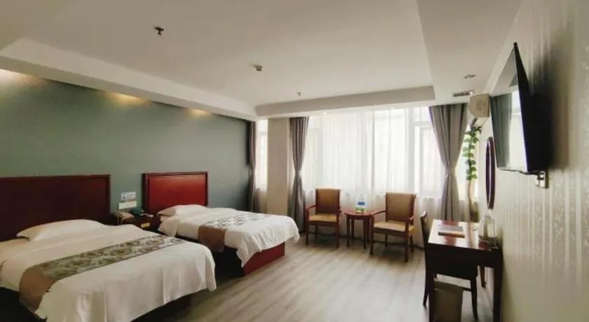 Bed in GreenTree Inn Suzhou Shengze Hotel