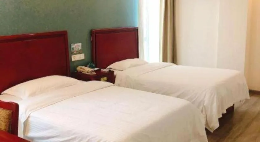 Bed in GreenTree Inn Suzhou Shengze Hotel