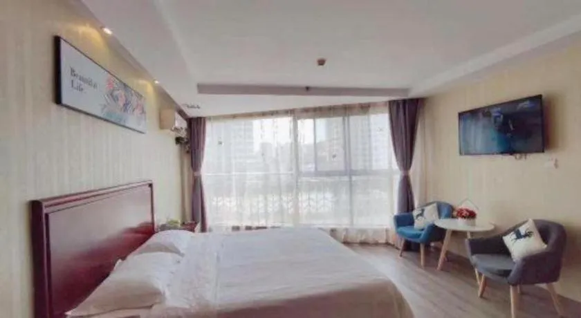 Bed in GreenTree Inn Suzhou Shengze Hotel