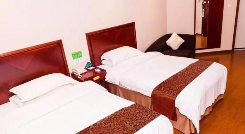 Bed in GreenTree Inn Suzhou Shengze Hotel