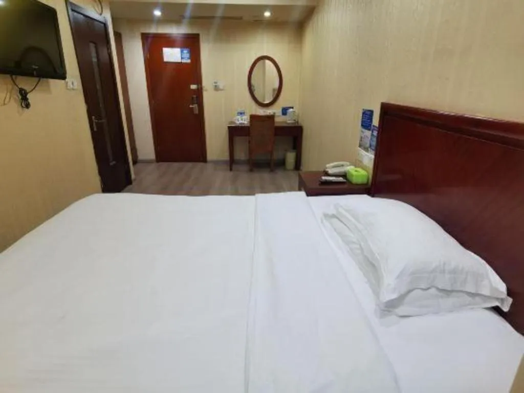 Bed in GreenTree Inn Suzhou Shengze Hotel