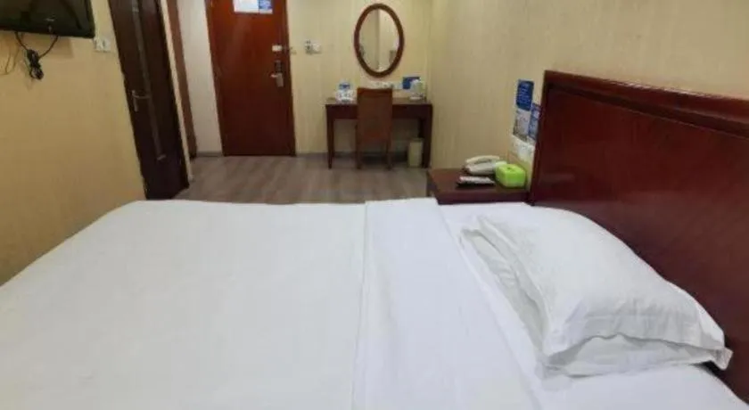 Bed in GreenTree Inn Suzhou Shengze Hotel