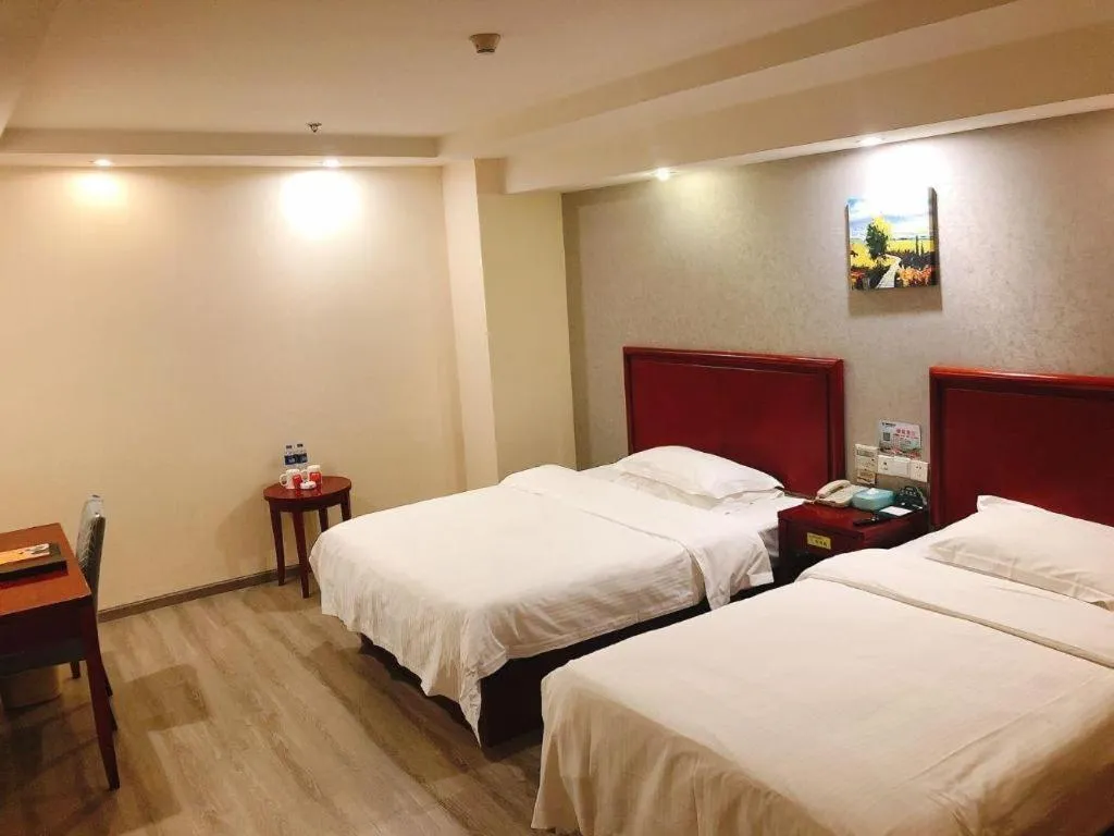 Bed in GreenTree Inn Suzhou Shengze Hotel