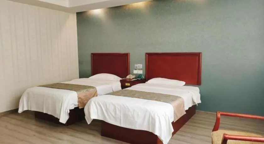 Bed in GreenTree Inn Suzhou Shengze Hotel