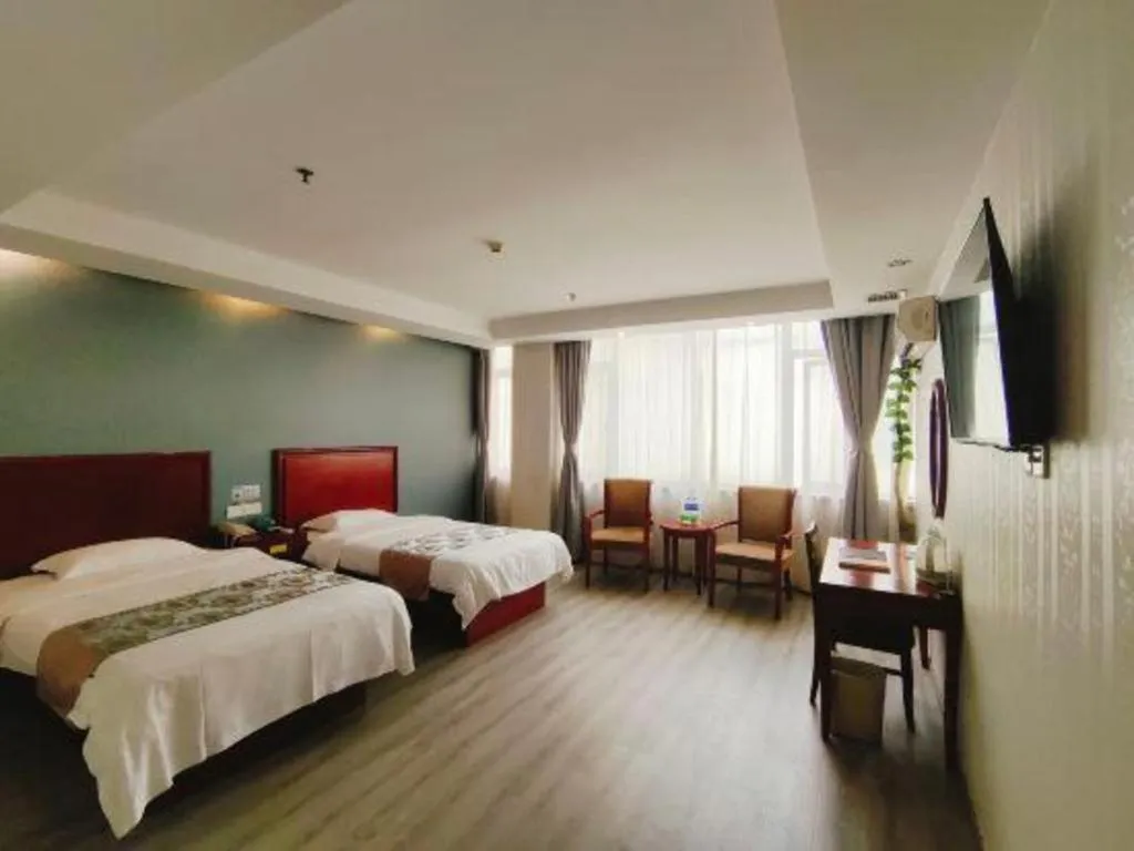 Bed in GreenTree Inn Suzhou Shengze Hotel