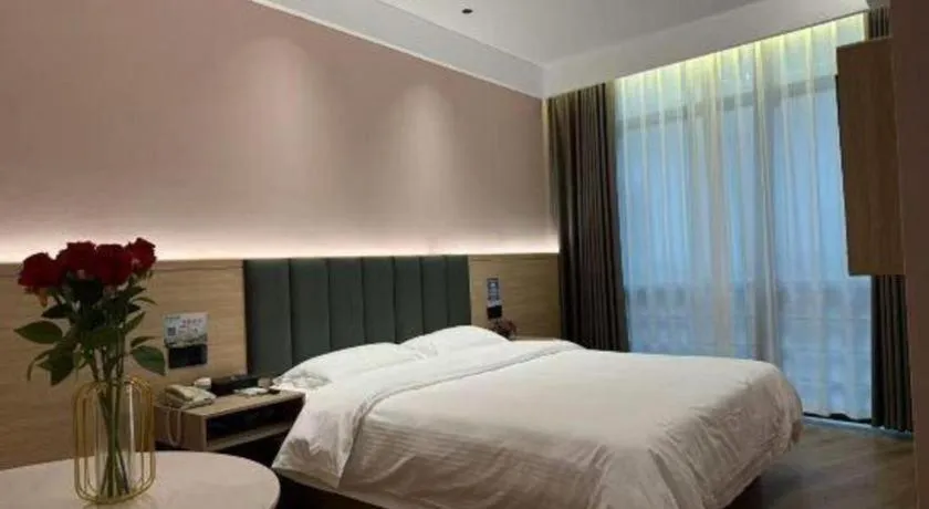 Bed in GreenTree Inn Suzhou Shengze Hotel