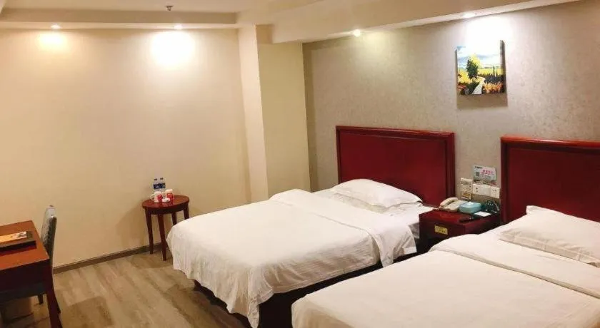 Bed in GreenTree Inn Suzhou Shengze Hotel