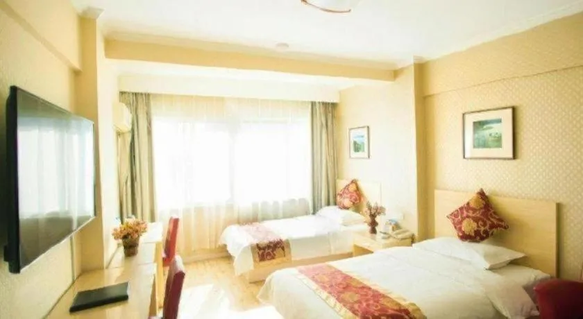 Bed in Super 8 Hotel Chengde Imperial Summer Resort