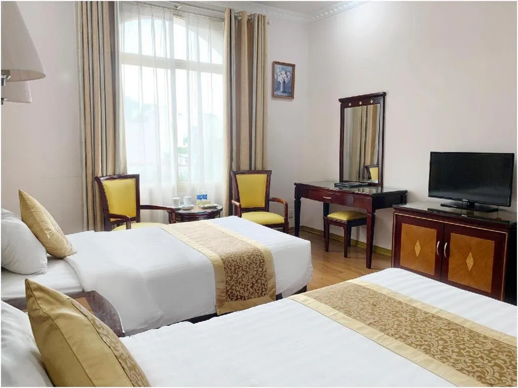 Bed in Cong Doan Viet Nam Hotel