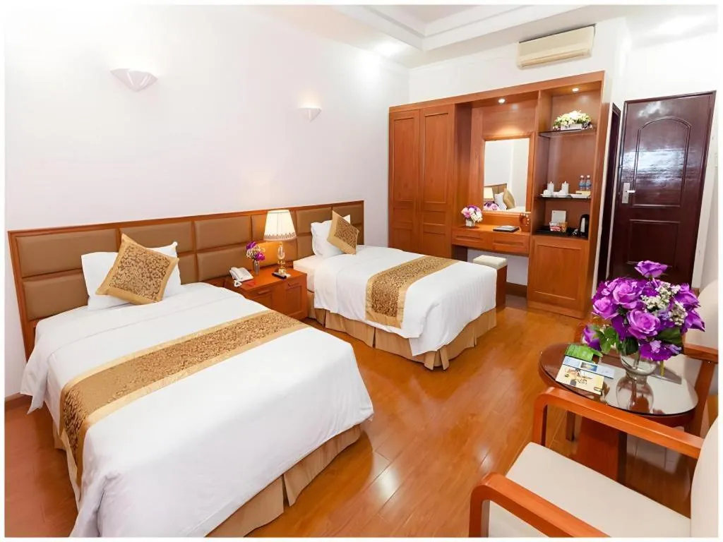 Bed in Cong Doan Viet Nam Hotel