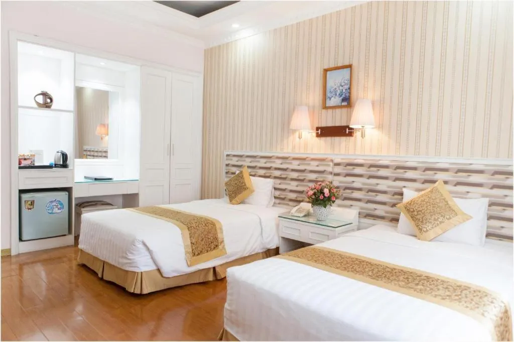 Bed in Cong Doan Viet Nam Hotel