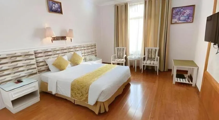 Bed in Cong Doan Viet Nam Hotel