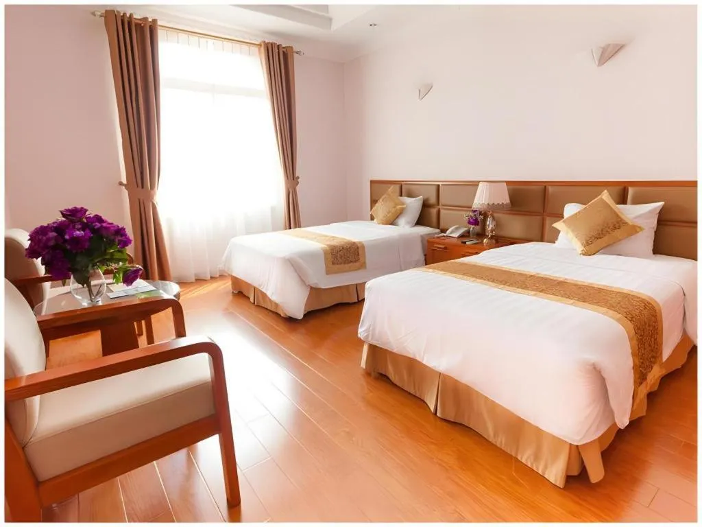 Bed in Cong Doan Viet Nam Hotel