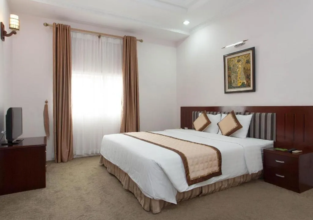 Bed in Cong Doan Viet Nam Hotel