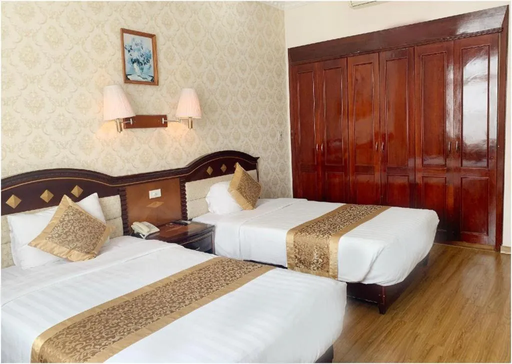 Bed in Cong Doan Viet Nam Hotel