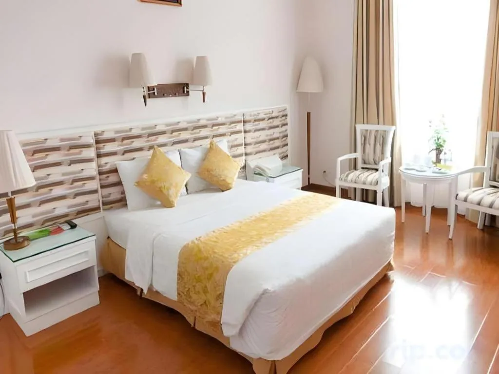 Bed in Cong Doan Viet Nam Hotel