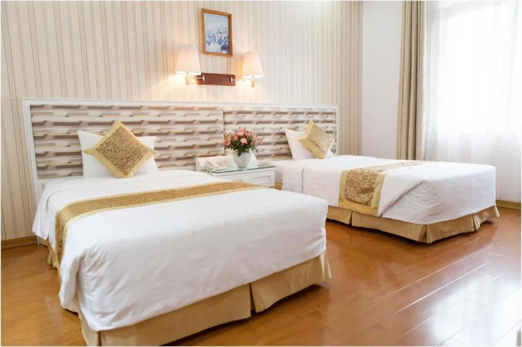 Bed in Cong Doan Viet Nam Hotel