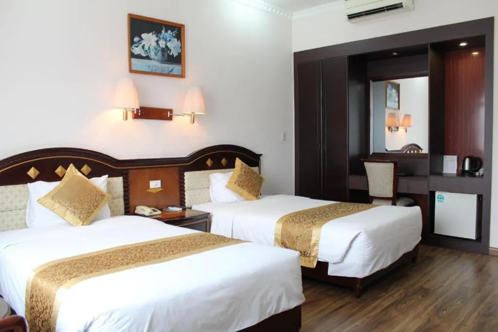 Bed in Cong Doan Viet Nam Hotel