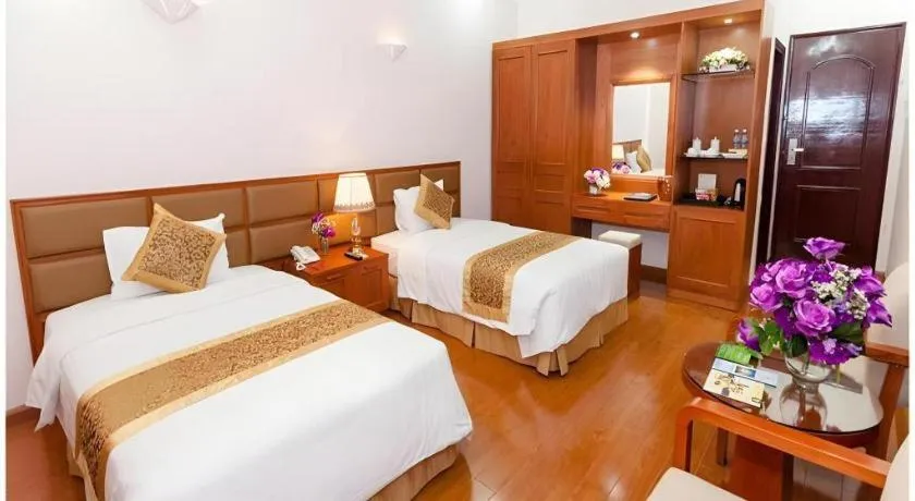 Bed in Cong Doan Viet Nam Hotel