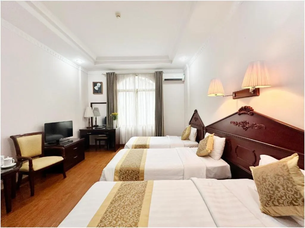 Bed in Cong Doan Viet Nam Hotel