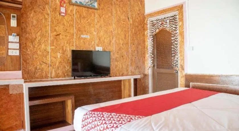 Bed in OYO 797 Pink House Bungalow