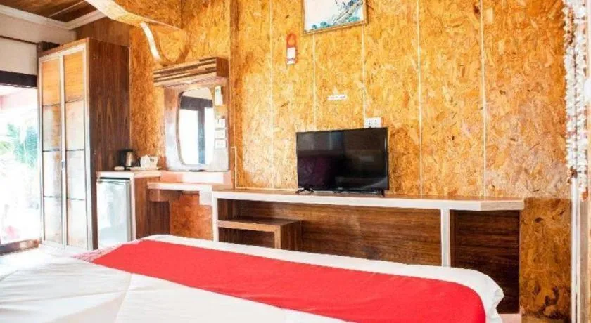 Bed in OYO 797 Pink House Bungalow