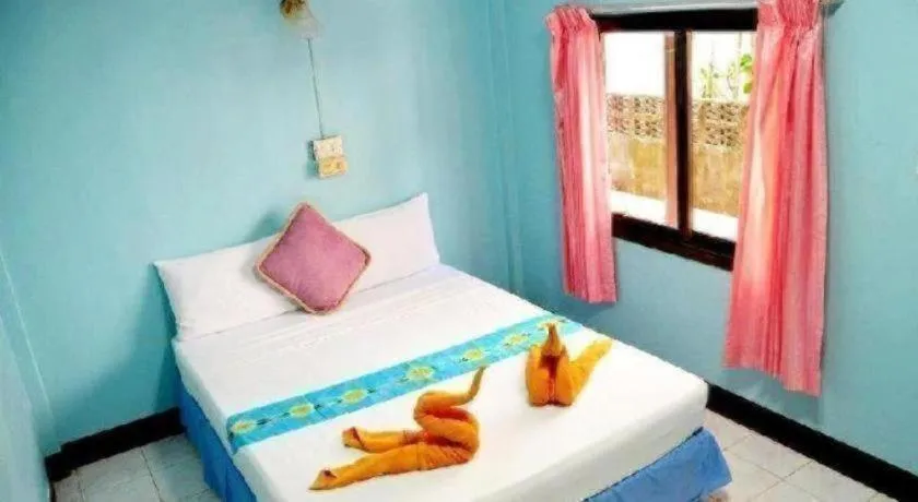 Bed in OYO 797 Pink House Bungalow