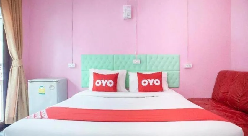 Bed in OYO 797 Pink House Bungalow