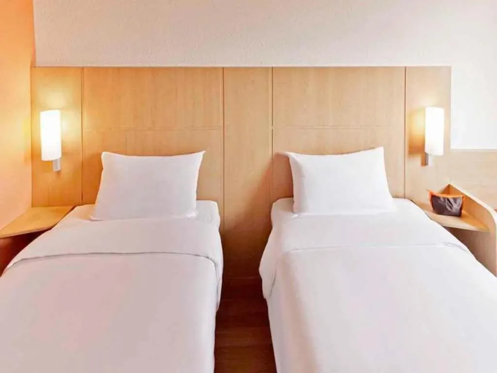 Bed in Ibis Shanghai Expo Dongming Road Metro Station