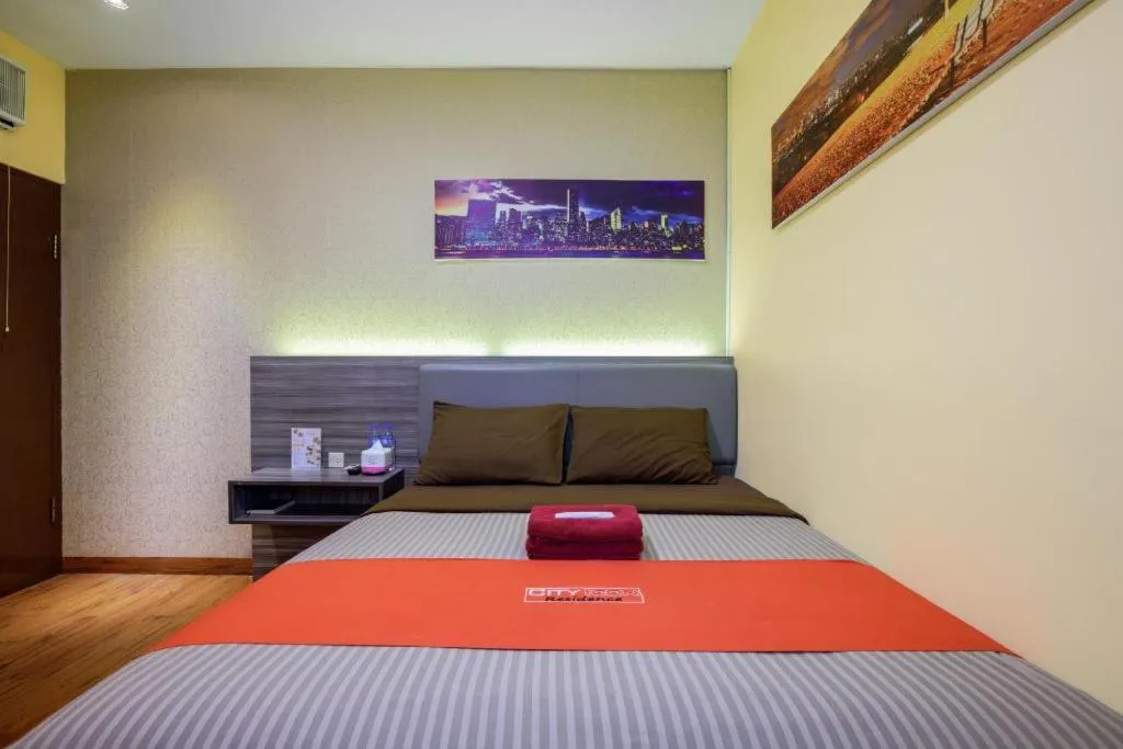 Bed in City Icon Residence