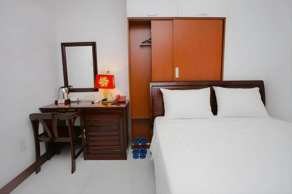 Bed in Nhatrang Cozy Hotel