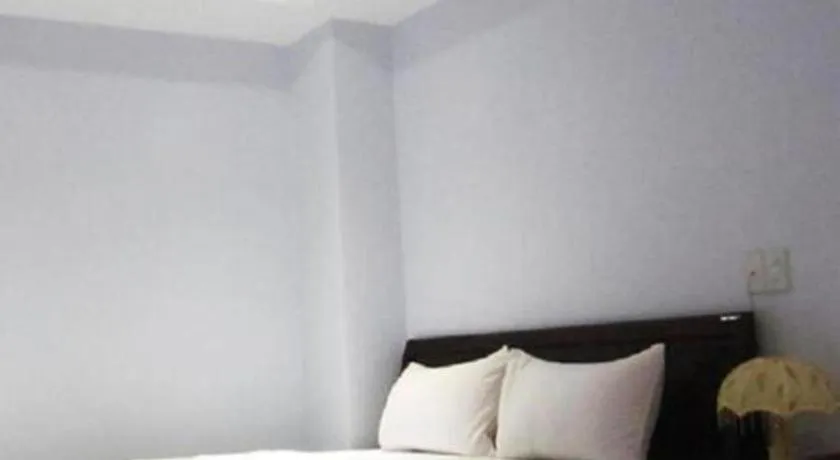 Bed in Nhatrang Cozy Hotel