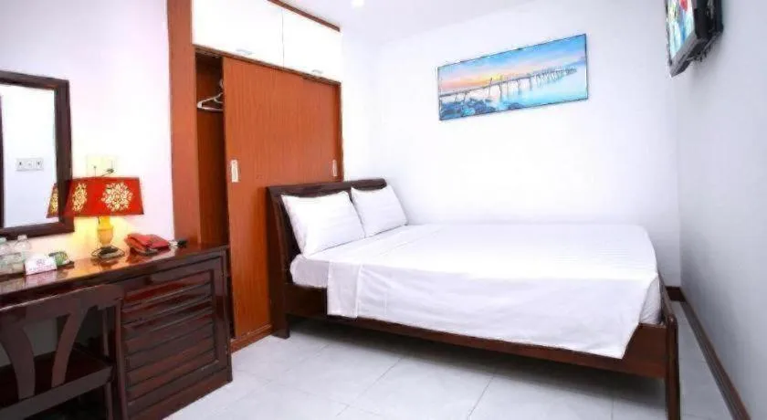 Bed in Nhatrang Cozy Hotel