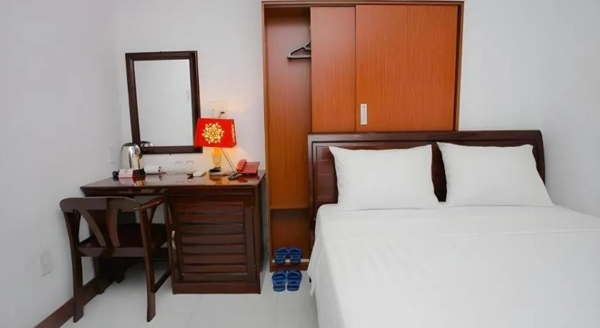 Bed in Nhatrang Cozy Hotel