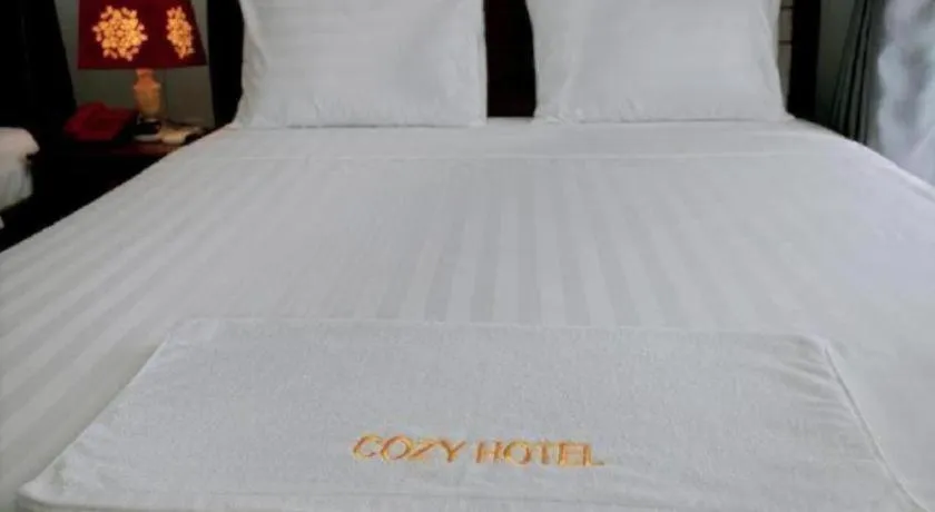 Bed in Nhatrang Cozy Hotel