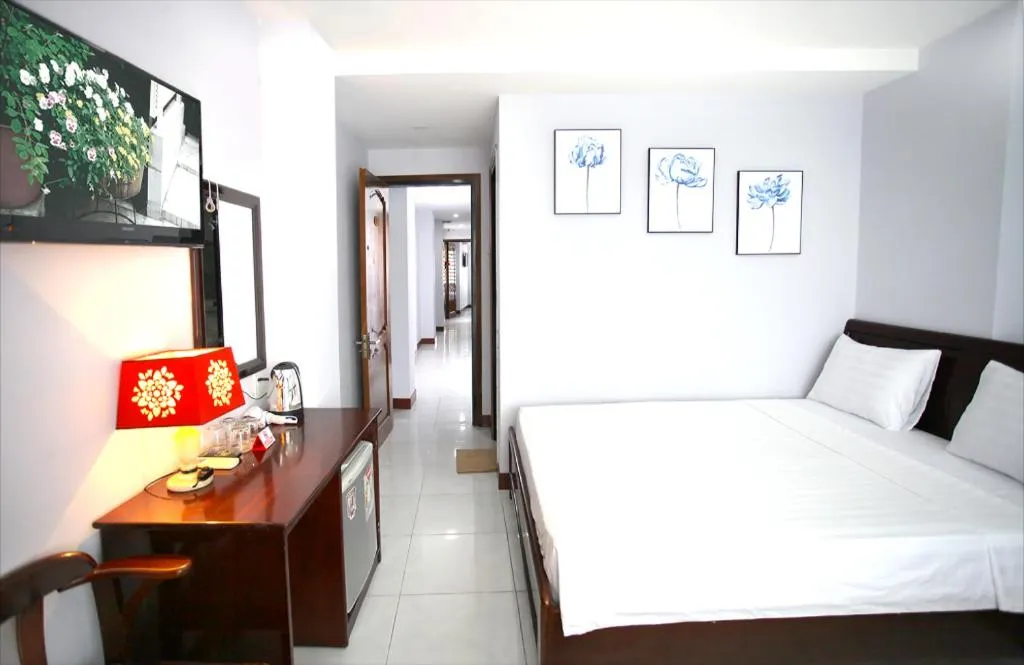 Bed in Nhatrang Cozy Hotel