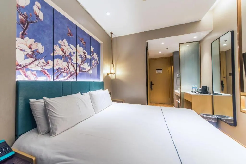 Bed in Jinjiang Inn Jinan Shimao Kuanhouli Quancheng Road