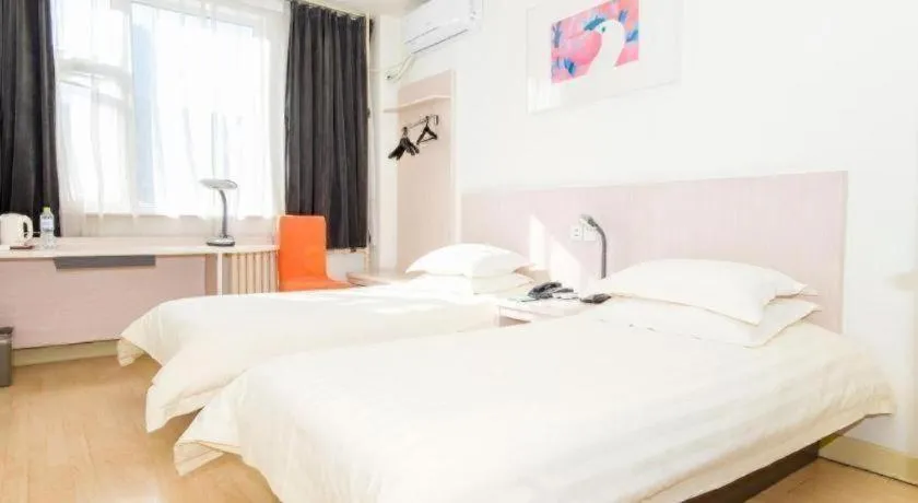 Bed in Jinjiang Inn Jinan Shimao Kuanhouli Quancheng Road